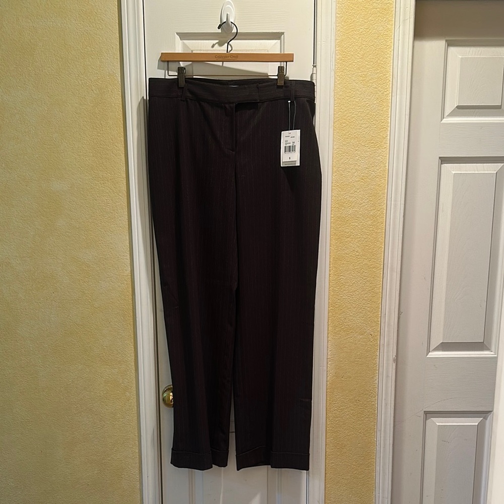 CAbi Classic Black Cuffed Pinstripe Trousers
Beautifully Made
New With Tags